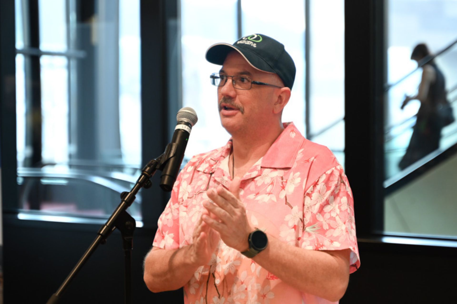 Jason speaks at a book launch, 2025